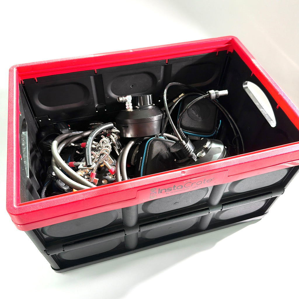 Gear crate with Gemini heads with protective caps and covers on